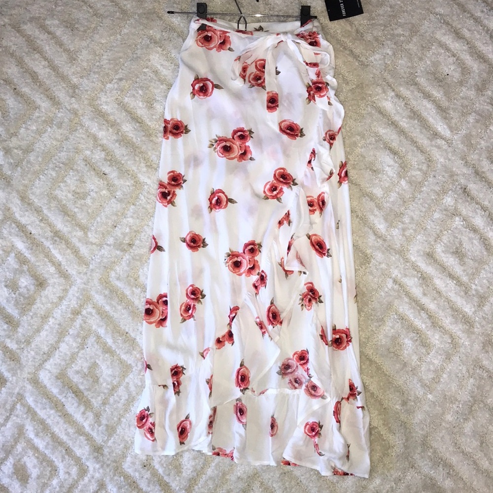 Wrap maxi skirt with ruffles.